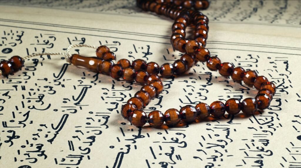 Quran the holy book of muslim religion and Pray Counting Bead